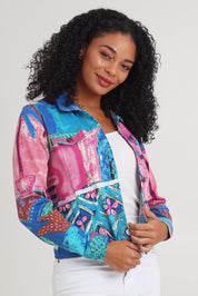 Model Ziara wearing size 10 of the Printed Cotton Ponte Jacket in colour Marrakesh, from the front, cropped image
