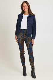 Model Amanda wearing size 10 of the Reversible Jacket in colour Maluku (Blue), from the front, showing the whole outfit