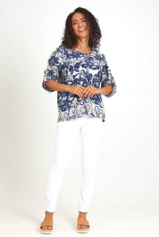 Model Pamelar wearing size 10 of the Frill Neckline Top – Print in colour Print, from the front