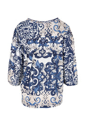 Product shot of the Frill Neckline Top – Print in colour Print, from the back