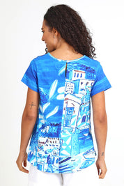 Model Pamelar wearing size 10 of the V Contemporary T-Shirt – Island in colour Island, from the back