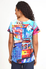 Model Pamelar wearing size 10 of the V-Contemporary T-Shirt – Lisbon in colour Lisbon, from the back