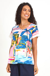 Model Pamelar wearing size 10 of the V Contemporary T-Shirt – Yacht in colour Yacht, in a cropped view