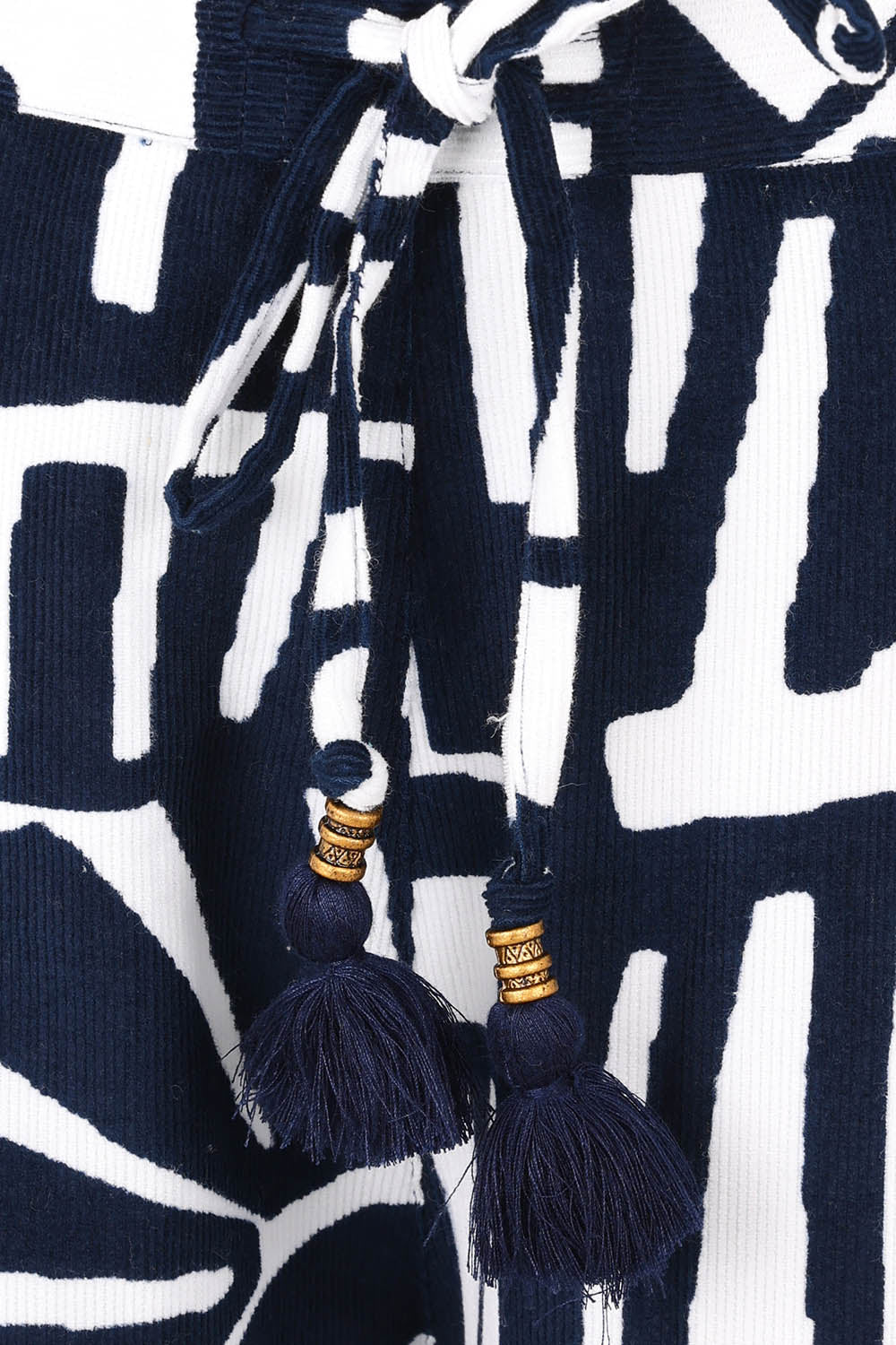 Product shot of the Corduroy Flared Trouser in colour Navy (Blue), detail