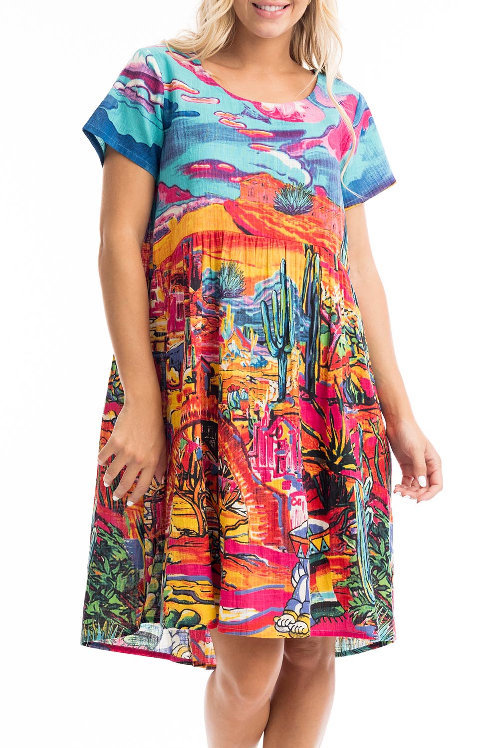 A model wearing the Ocampo Organic Cotton Boxy Ruched Waist Dress in colour Print (Blue), from the front, cropped image