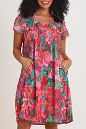 Model Ziara wearing size 10 of the Ezy Fit Cotton Dress in colour Saopaulo, from the front, cropped image
