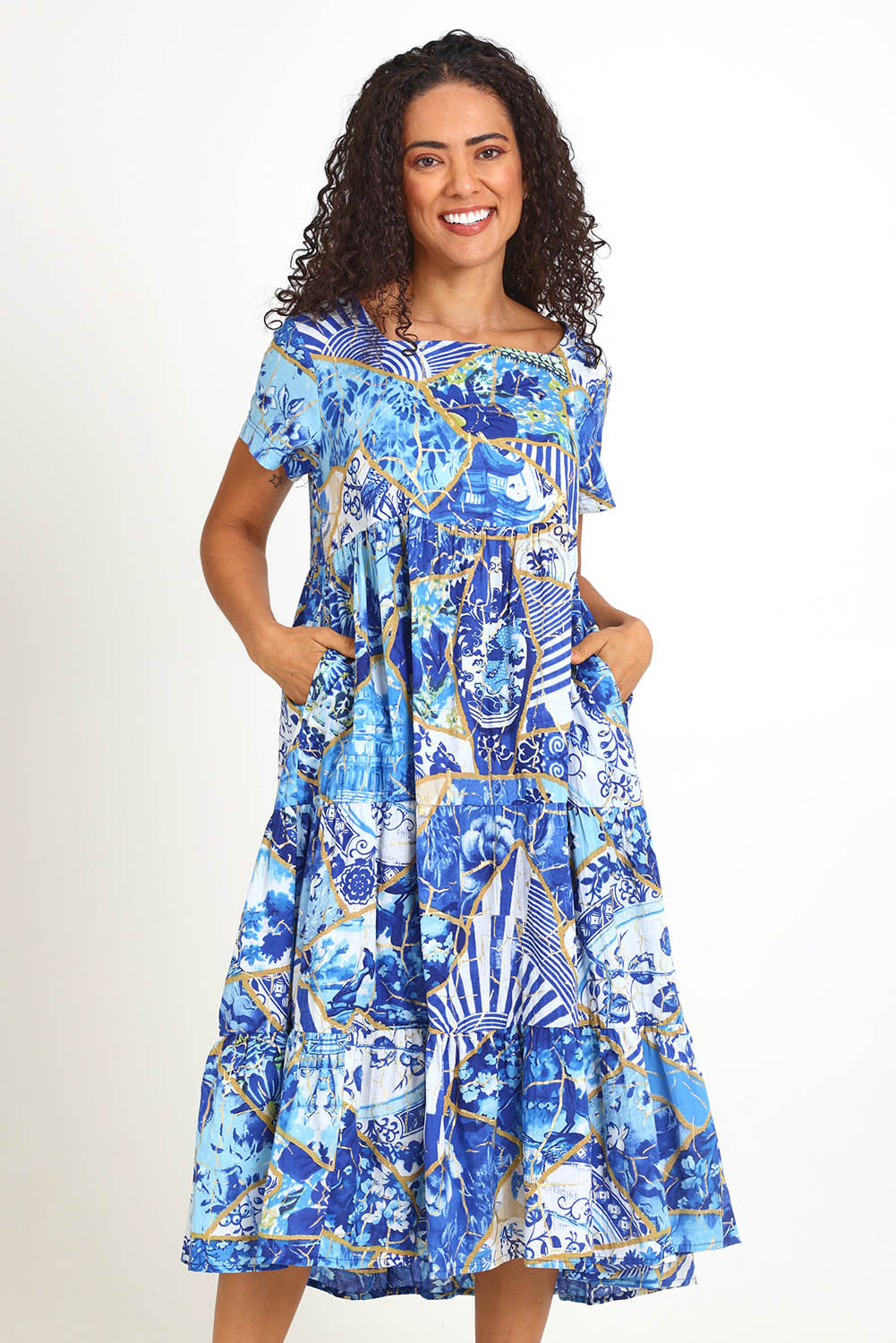 Model Pamelar wearing size 10 of the Square Neckline  Midi Dress – Print in colour Print, from the front