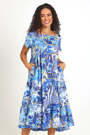 Model Pamelar wearing size 10 of the Square Neckline  Midi Dress – Print in colour Print, from the front