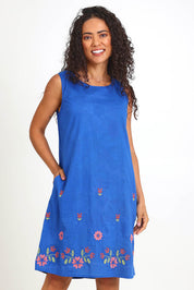 Model Pamelar wearing size 10 of the Sleeveless Reversible Dress – Print in colour Print, in a cropped view