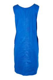 Product shot of the Sleeveless Reversible Dress – Print in colour Print, from the back