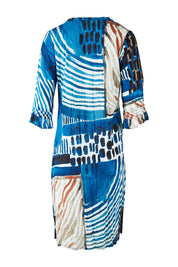 Product shot of the Alberobello Organic Cotton Dress in colour Blue (Blue), from the back