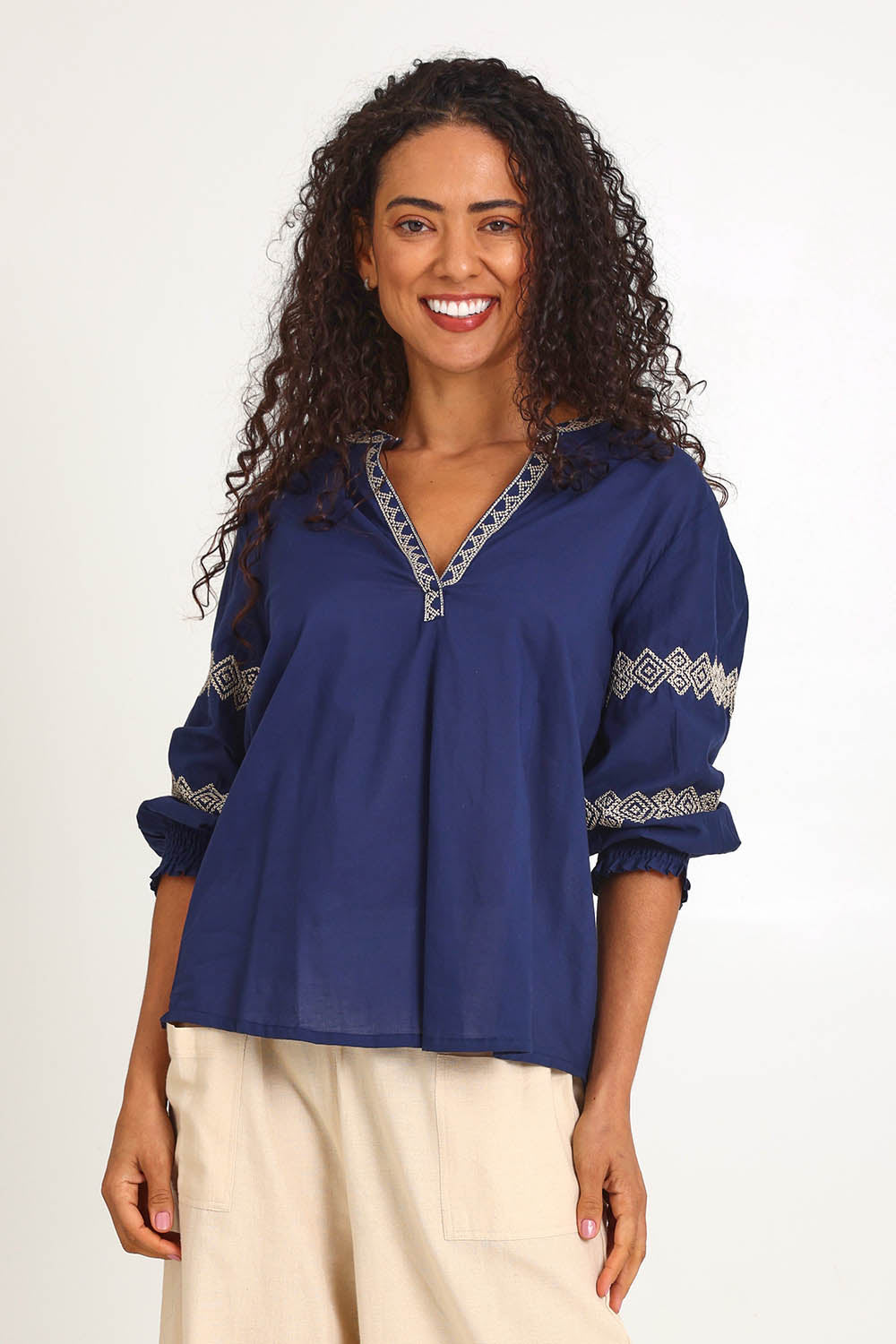 Model Pamelar wearing size 10 of the Essentials Embroidered Cotton Top - Navy in colour Navy, in a cropped view