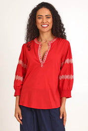 Model Pamelar wearing size 10 of the Essentials Embroidered Cotton Top - Red in colour Red, in a cropped view