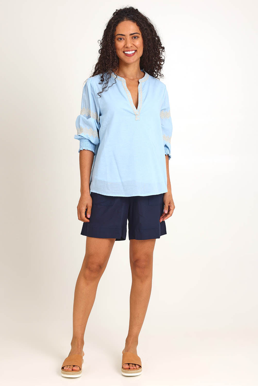 Model Pamelar wearing size 10 of the Essentials Embroidered Cotton Top - Sky in colour Sky, from the front
