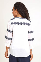 Model Pamelar wearing size 10 of the Essentials Embroidered Cotton Top - White in colour White, from the back
