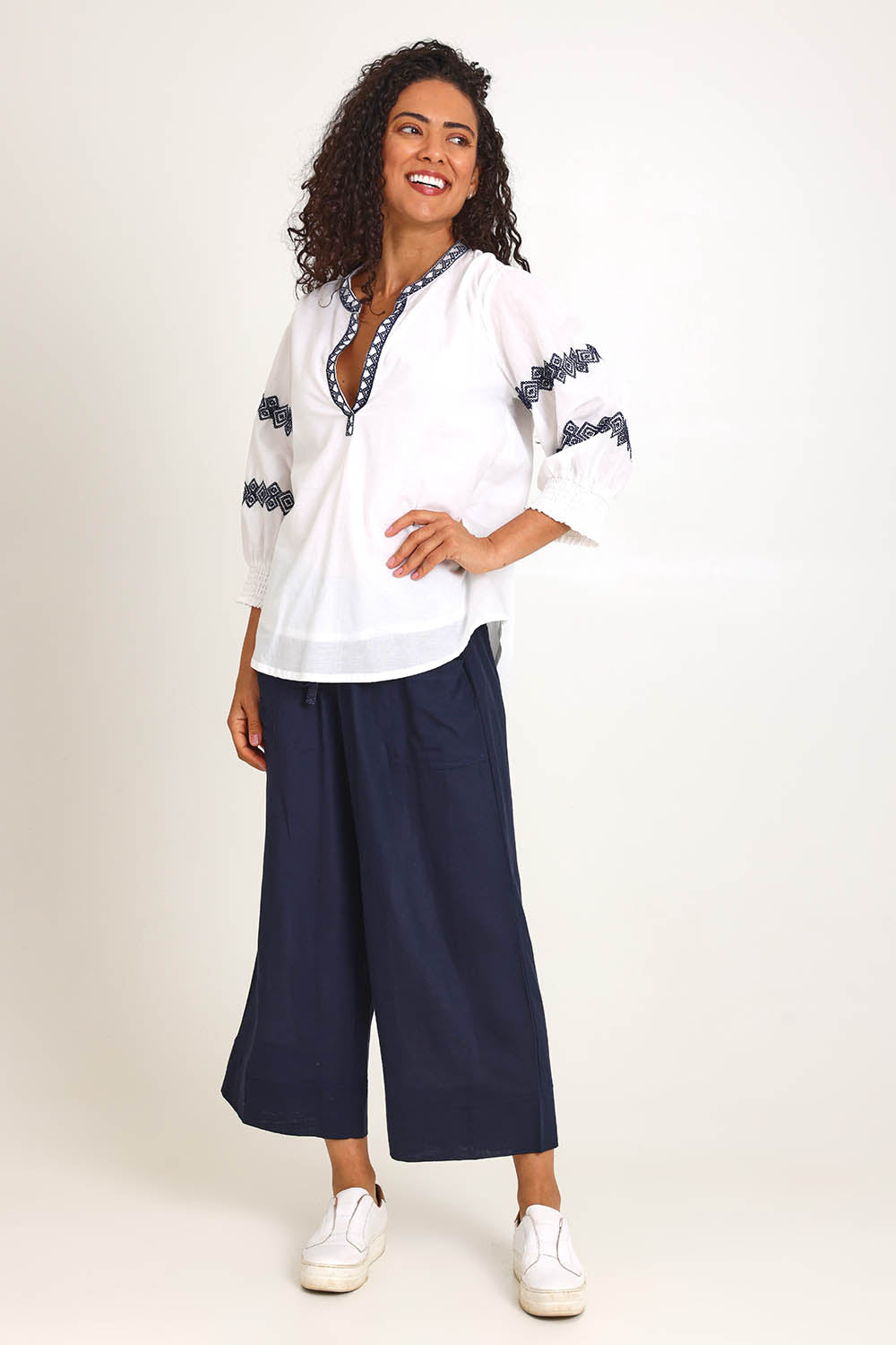 Model Pamelar wearing size 10 of the Essentials Embroidered Cotton Top - White in colour White, from the front