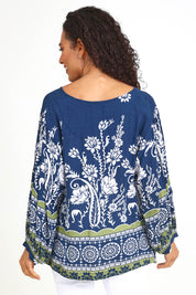 Model Pamelar wearing size 10 of the Paisley Border Top – Navy in colour Navy, from the back