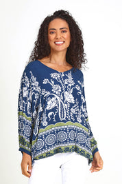 Model Pamelar wearing size 10 of the Paisley Border Top – Navy in colour Navy, in a cropped view