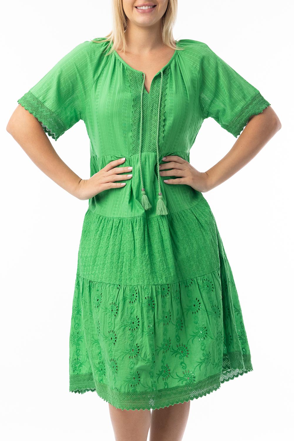 A model wearing the Essential Broderie Layers Cotton Dress in colour Green (Green), from the front, cropped image