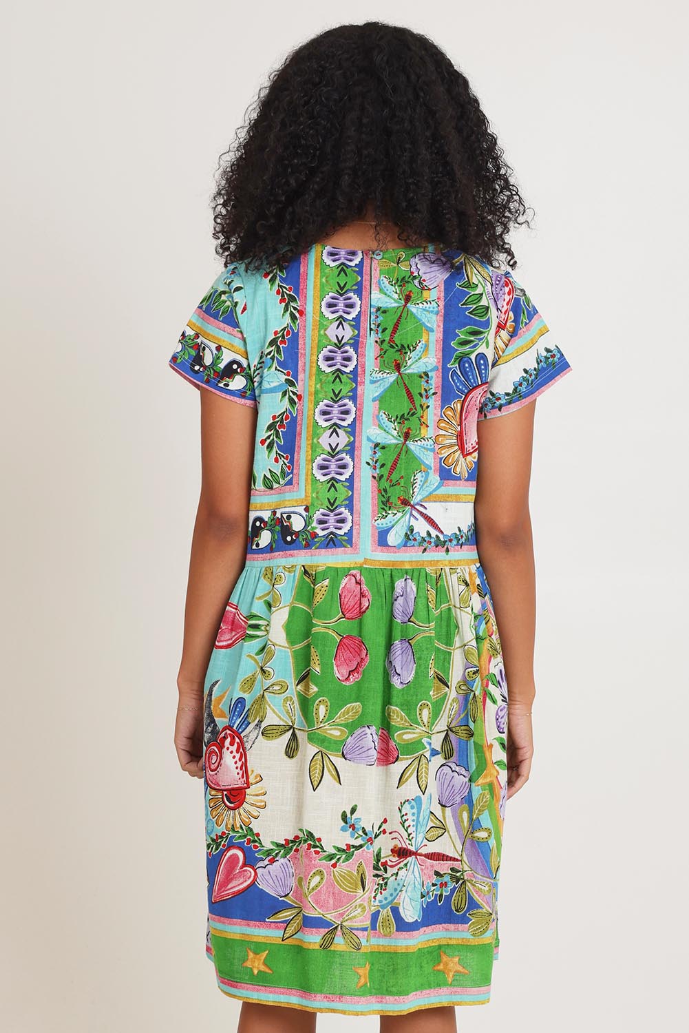 Model Ziara wearing size 10 of the Boxy Cotton Dress in colour Santafe, from the back