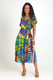 Model Pamelar wearing size 10 of the V-Neck Button Through Dress – Print in colour Print, from the front
