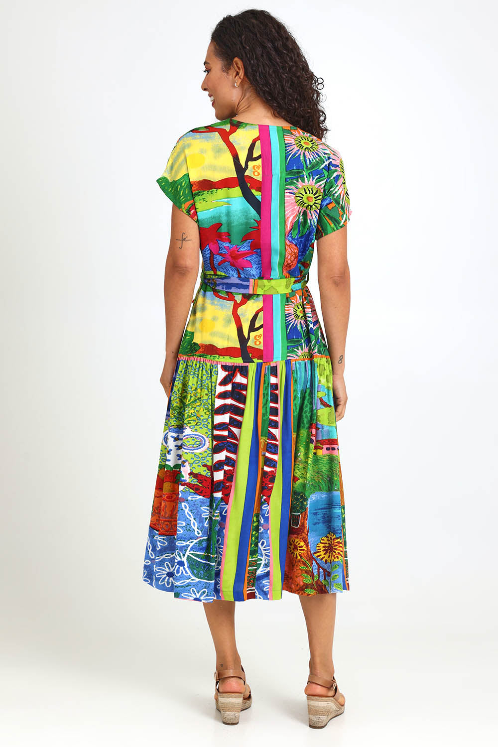 Model Pamelar wearing size 10 of the V-Neck Button Through Dress – Print in colour Print, from the front