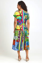 Model Pamelar wearing size 10 of the V-Neck Button Through Dress – Print in colour Print, from the front