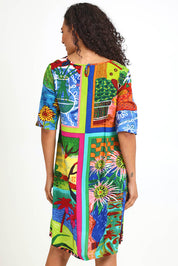 Model Pamelar wearing size 10 of the Contemporary Dress – Print in colour Print, from the back