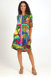 Model Pamelar wearing size 10 of the Contemporary Dress – Print in colour Print, from the front