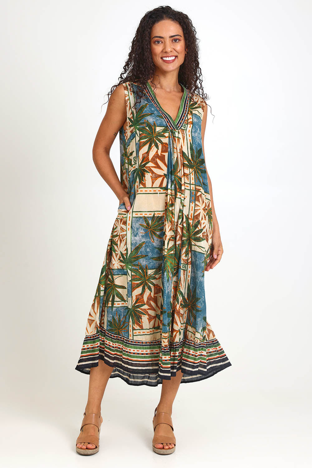 Model Pamelar wearing size 10 of the Sleeveless V  Maxi Dress – Print in colour Print, from the front