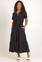 Model Pamelar wearing size 10 of the Essentials Poplin Short Sleeve Cotton Maxi Dress - Black in colour Black, from the front