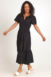 Model Pamelar wearing size 10 of the Essentials Poplin Short Sleeve Cotton Maxi Dress - Black in colour Black, from the front