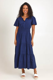 Model Pamelar wearing size 10 of the Essentials Poplin Short Sleeve Cotton Maxi Dress - Navy in colour Navy, from the front