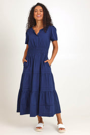 Model Pamelar wearing size 10 of the Essentials Poplin Short Sleeve Cotton Maxi Dress - Navy in colour Navy, from the front