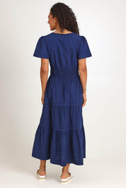 Model Pamelar wearing size 10 of the Essentials Poplin Short Sleeve Cotton Maxi Dress - Navy in colour Navy, from the front