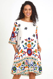 Model Pamelar wearing size 10 of the Contemporary Dress – Print in colour Print, in a cropped view