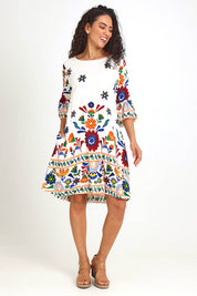 Model Pamelar wearing size 10 of the Contemporary Dress – Print in colour Print, from the front