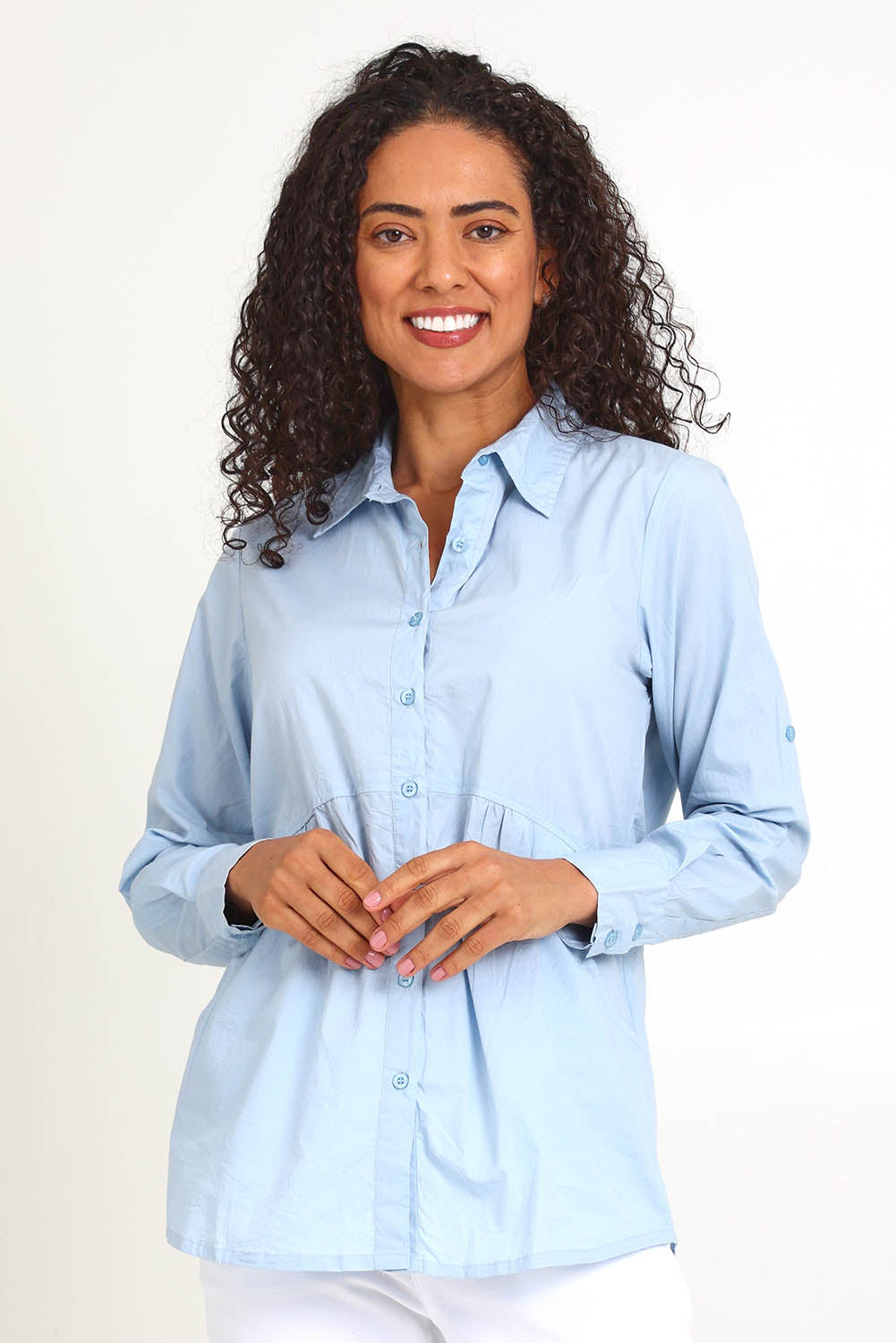 Model Pamelar wearing size 10 of the Essentials Poplin Cotton Shirt - Sky in colour Sky, in a cropped view
