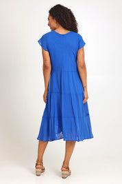 Model Pamelar wearing size 10 of the Essentials Bias Pockets Cotton Dress - Blue in colour Blue, from the front