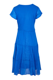 Product shot of the Essentials Bias Pockets Cotton Dress - Blue in colour Blue, from the back