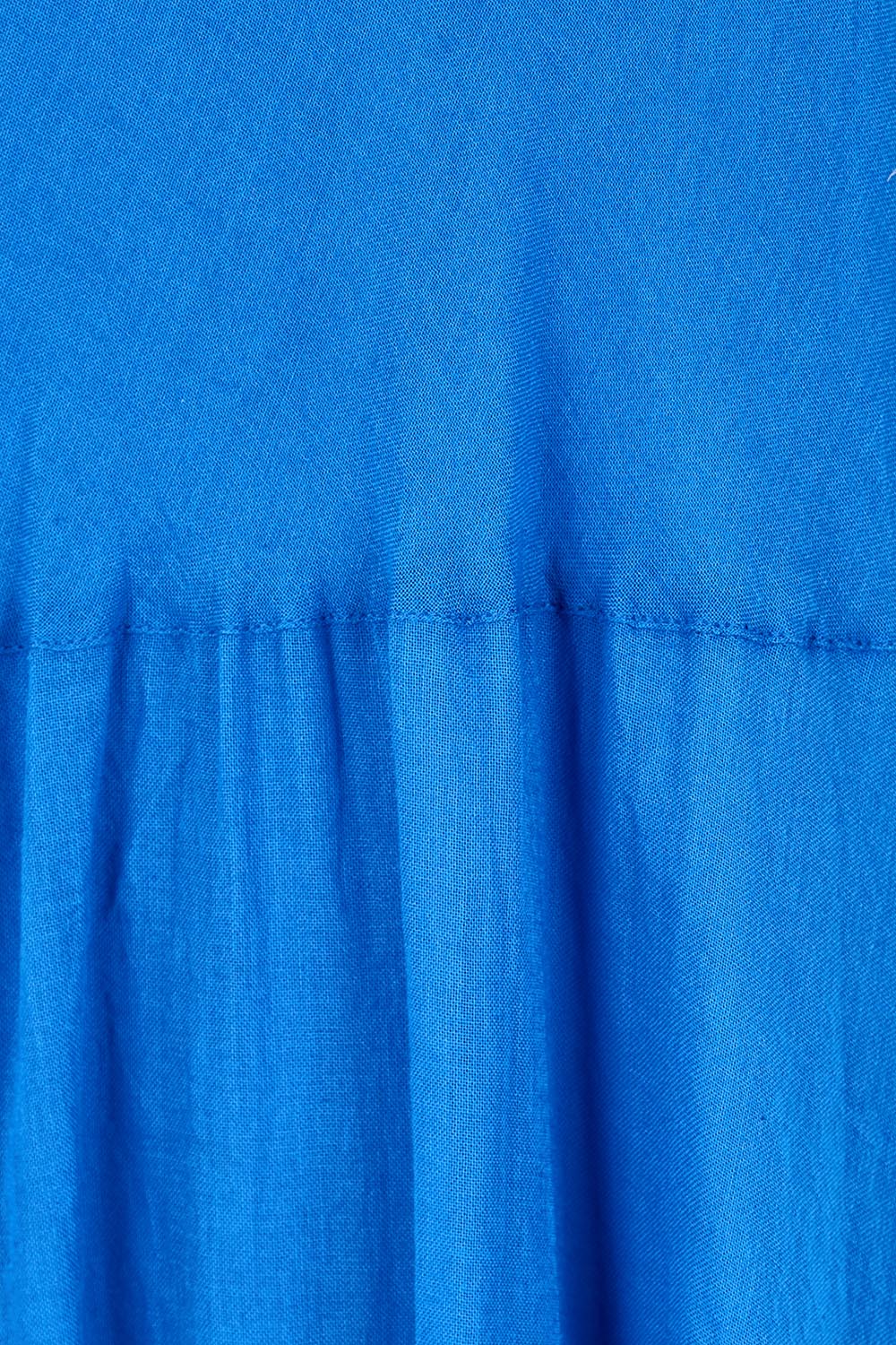 Product shot of the Essentials Bias Pockets Cotton Dress - Blue in colour Blue, showing detail