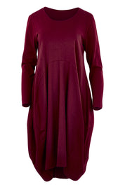 Product shot of the Bubble Dress in colour BurntRed (Red), from the front