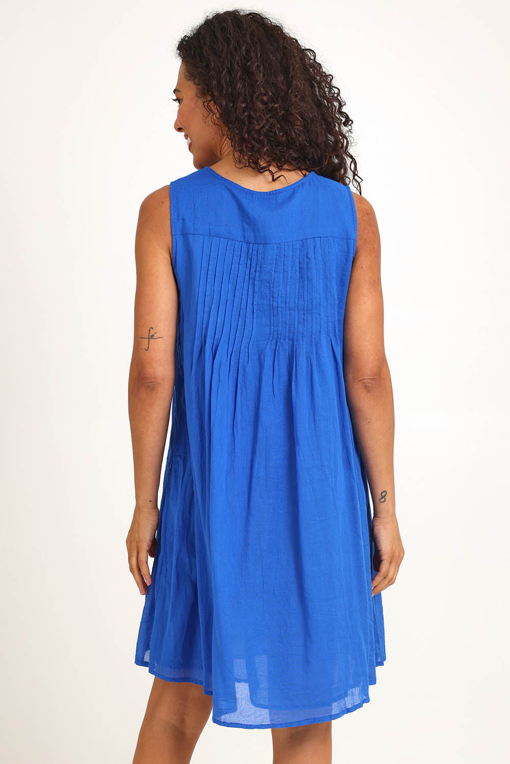 Model Pamelar wearing size 10 of the Essentials Easy Fit Sleeveless Cotton Dress - Blue in colour Blue, from the back