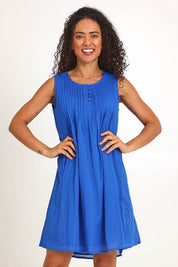Model Pamelar wearing size 10 of the Essentials Easy Fit Sleeveless Cotton Dress - Blue in colour Blue, in a cropped view