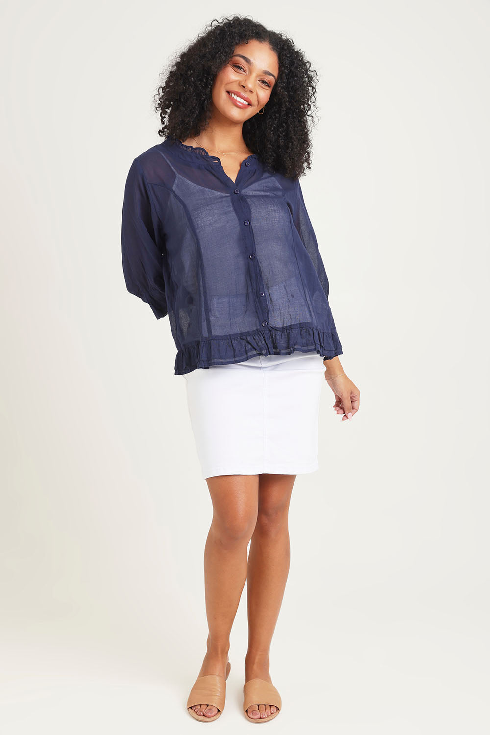 Model Ziara wearing size 10 of the Essentials Buttonthrough Cotton Top in colour Navy (Blue), from the front, showing the whole outfit