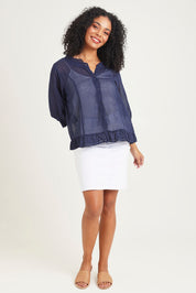 Model Ziara wearing size 10 of the Essentials Buttonthrough Cotton Top in colour Navy (Blue), from the front, showing the whole outfit