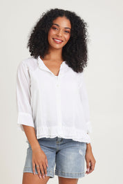 Model Ziara wearing size 10 of the Essentials Buttonthrough Cotton Top in colour White (White), from the front, cropped image
