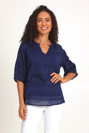 Model Pamelar wearing size 10 of the Essentials Pleated Cotton Top - Navy in colour Navy, in a cropped view