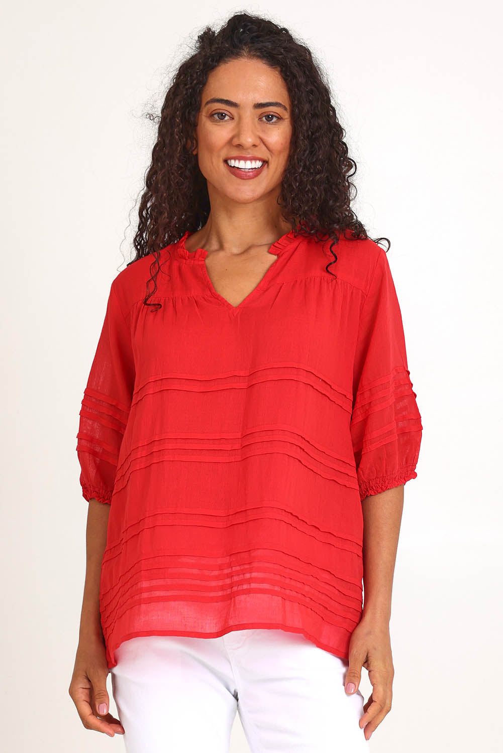Model Pamelar wearing size 10 of the Essentials Pleated Cotton Top - Red in colour Red, in a cropped view