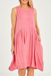 Model Kelly wearing size 10 of the Essentials Linen Blend Bubble Dress in colour Pinkpunch (Pink), from the front, cropped image